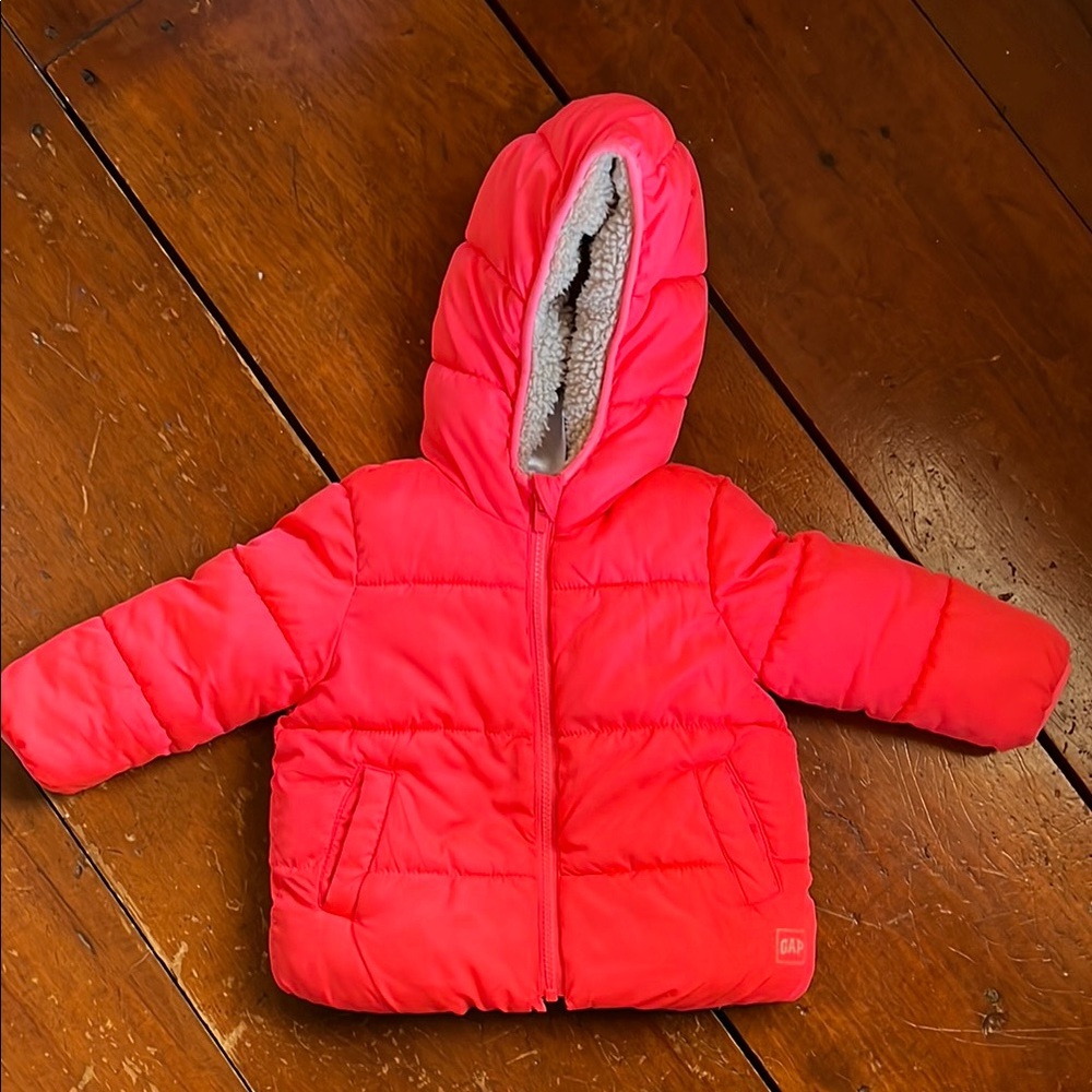 Neon pink reversible puffer coat